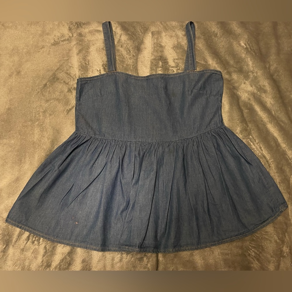 Denim peplum top.